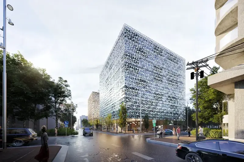 An architectural visualization of Domus Cube and its faceted facade in Tirana